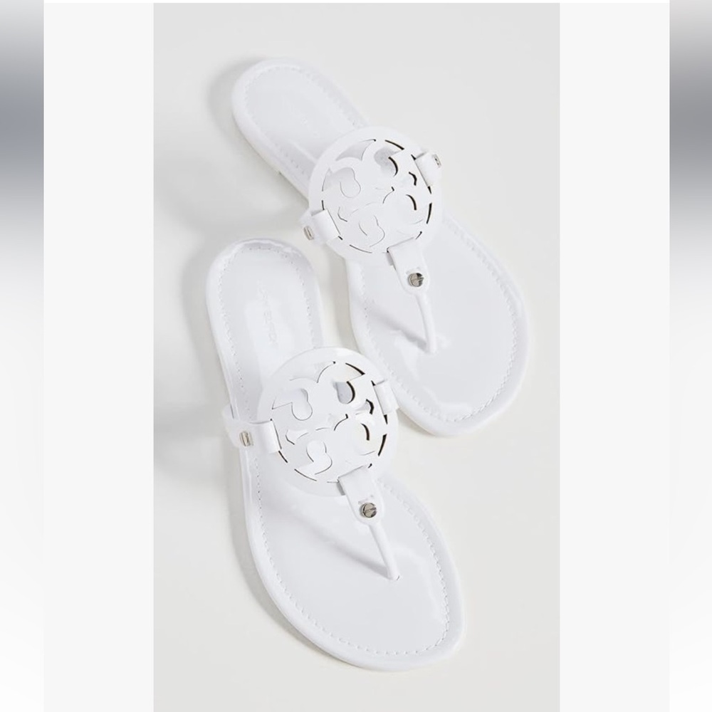Tory Burch 
Miller cut-out leather flip-flops
$267 Sandals Sz 59 optical white - Picture 2 of 16